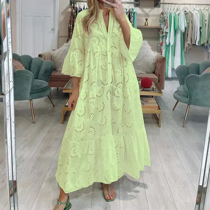 WW | Elegantes Kleid mit Bestickten Ösen