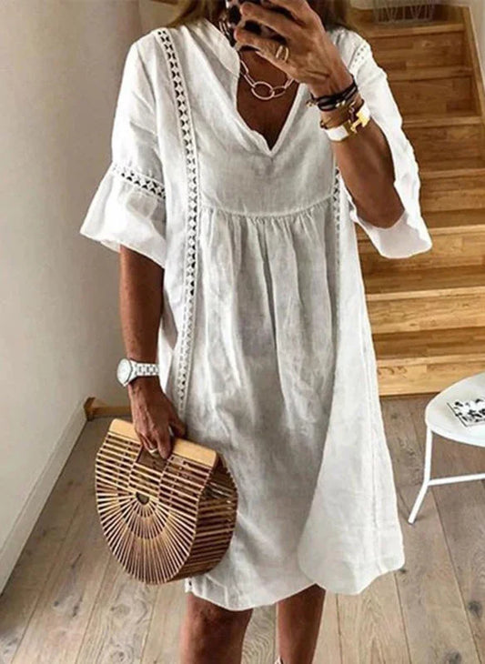 Weißes Tunika-Minikleid für Damen mit Spitzenbesatz und V-Ausschnitt